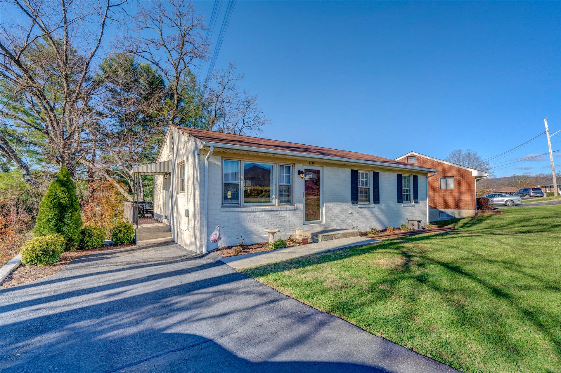 1716 Mountain View Road Vinton, VA 24179 - Photo 3 of 28 a front view of a house with a yard