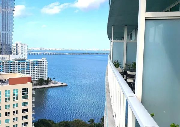 a view of balcony with outdoor seating