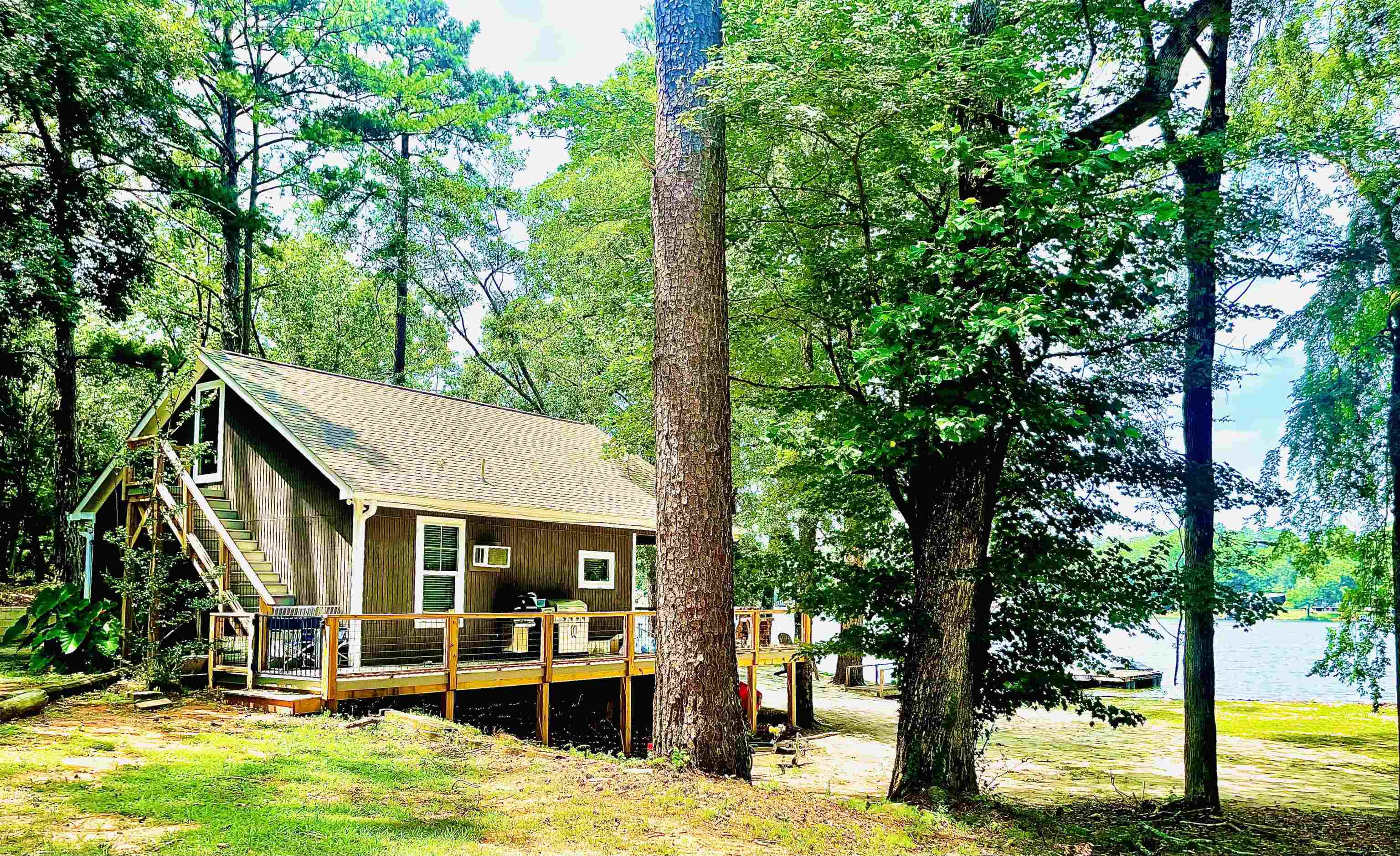 670 Barnetts Bridge Road Jackson, GA 30233 - Photo 1 of 1 a view of a house with a large tree