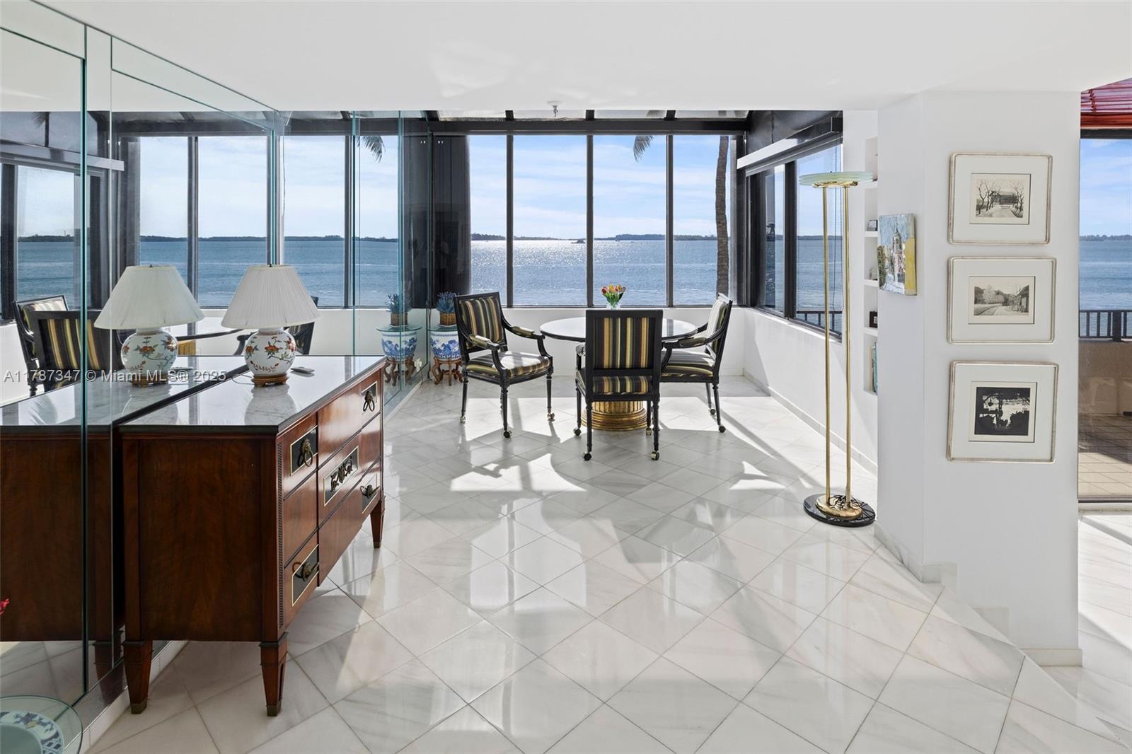 520 Brickell Key Drive, Unit A201 Miami, FL 33131 - Photo 16 of 52 a view of a livingroom with furniture and window