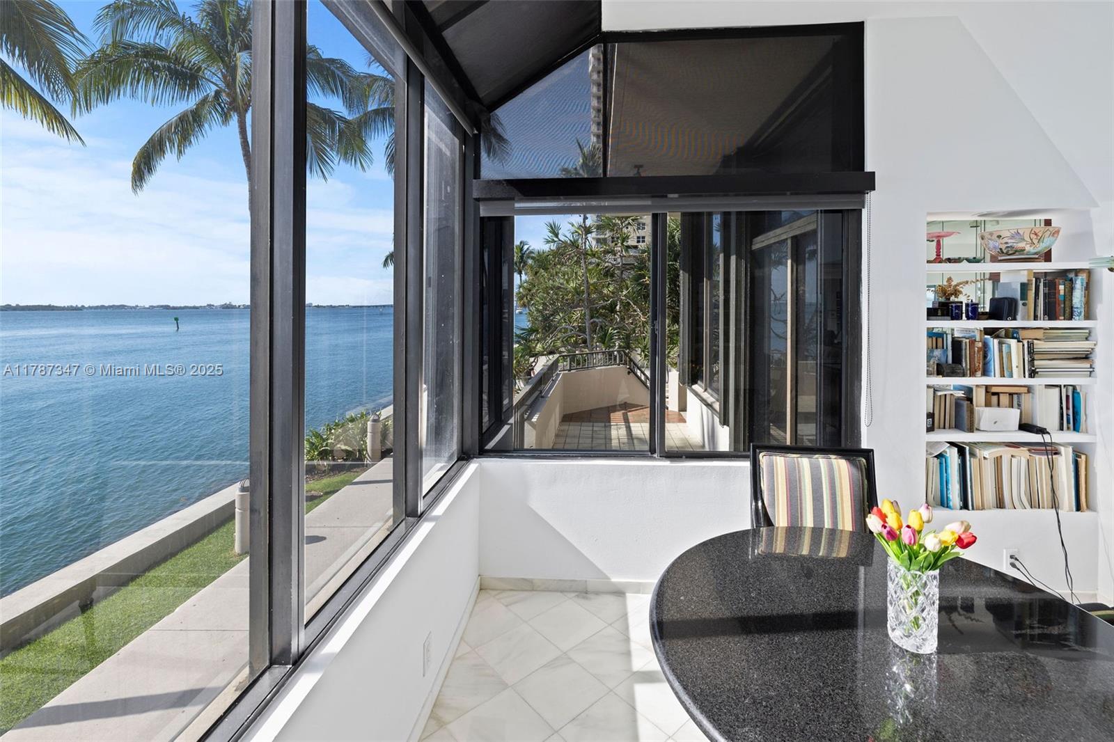 520 Brickell Key Drive, Unit A201 Miami, FL 33131 - Photo 17 of 52 a view of living room with furniture and floor to ceiling window