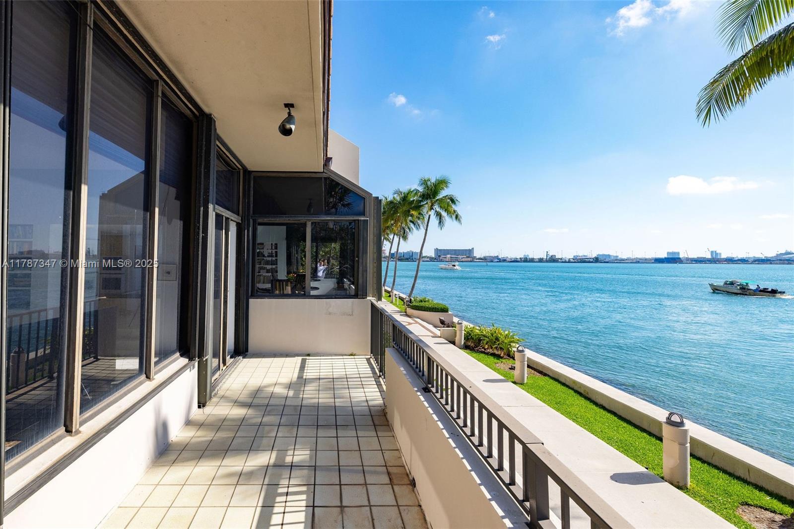 520 Brickell Key Drive, Unit A201 Miami, FL 33131 - Photo 32 of 52 a view of balcony with an ocean view