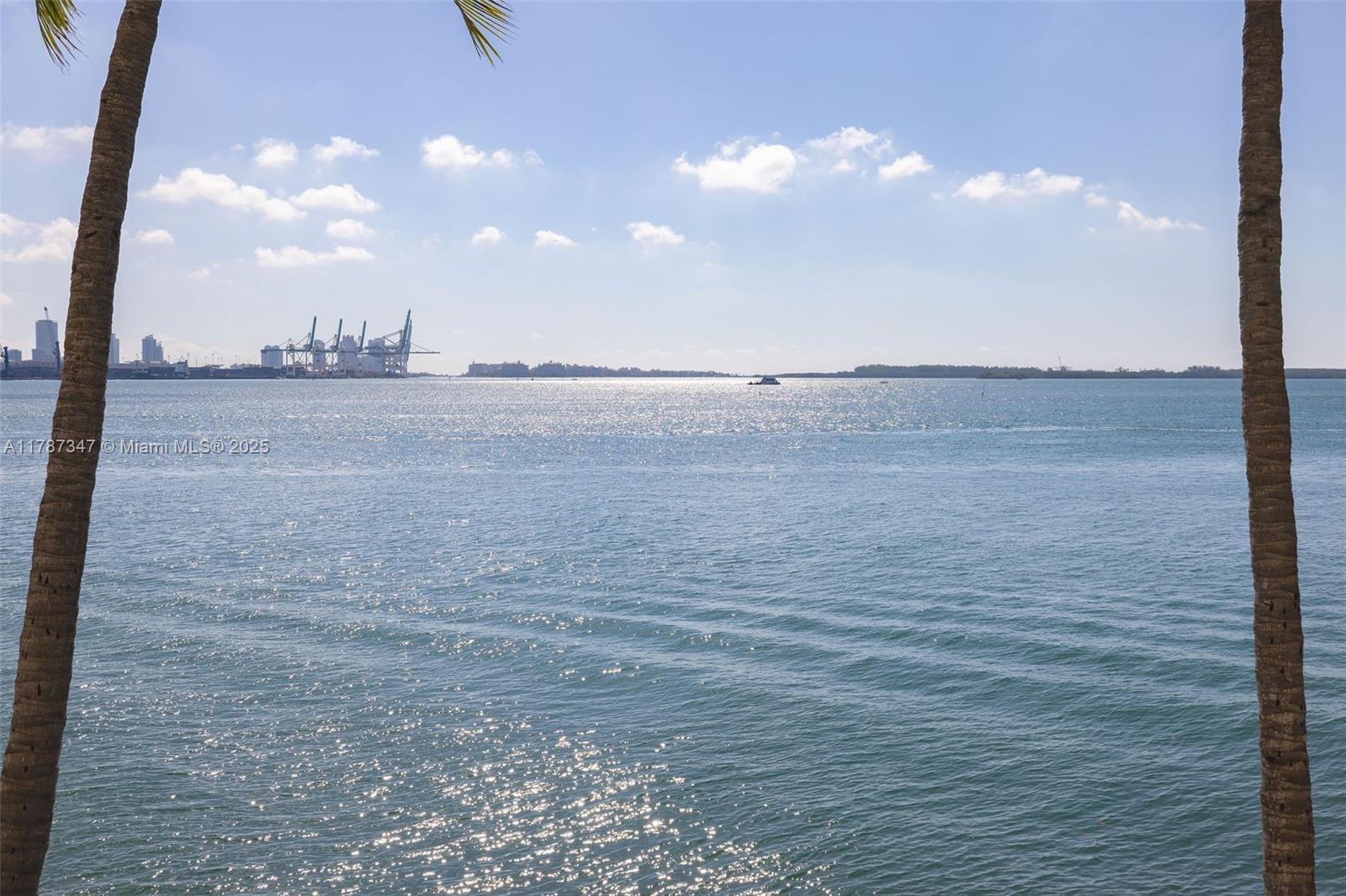 520 Brickell Key Drive, Unit A201 Miami, FL 33131 - Photo 37 of 52 a view of an ocean and beach