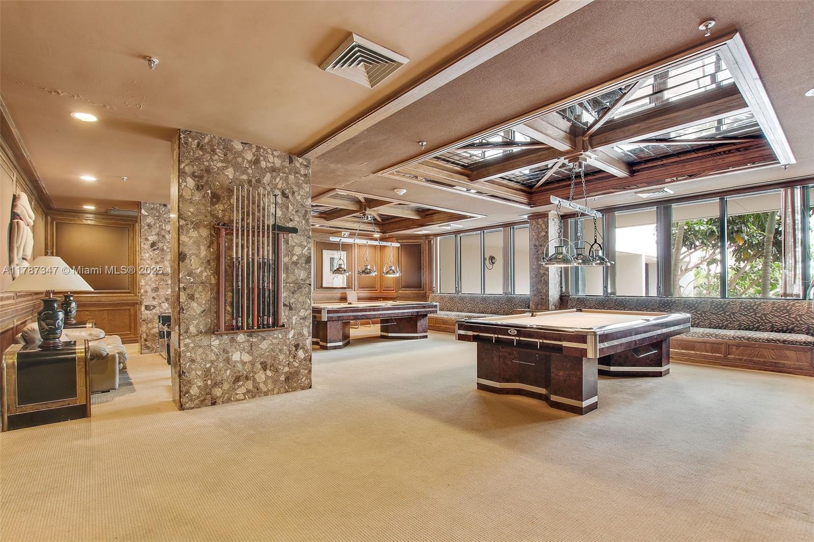 520 Brickell Key Drive, Unit A201 Miami, FL 33131 - Photo 52 of 52 a room with pool table and windows