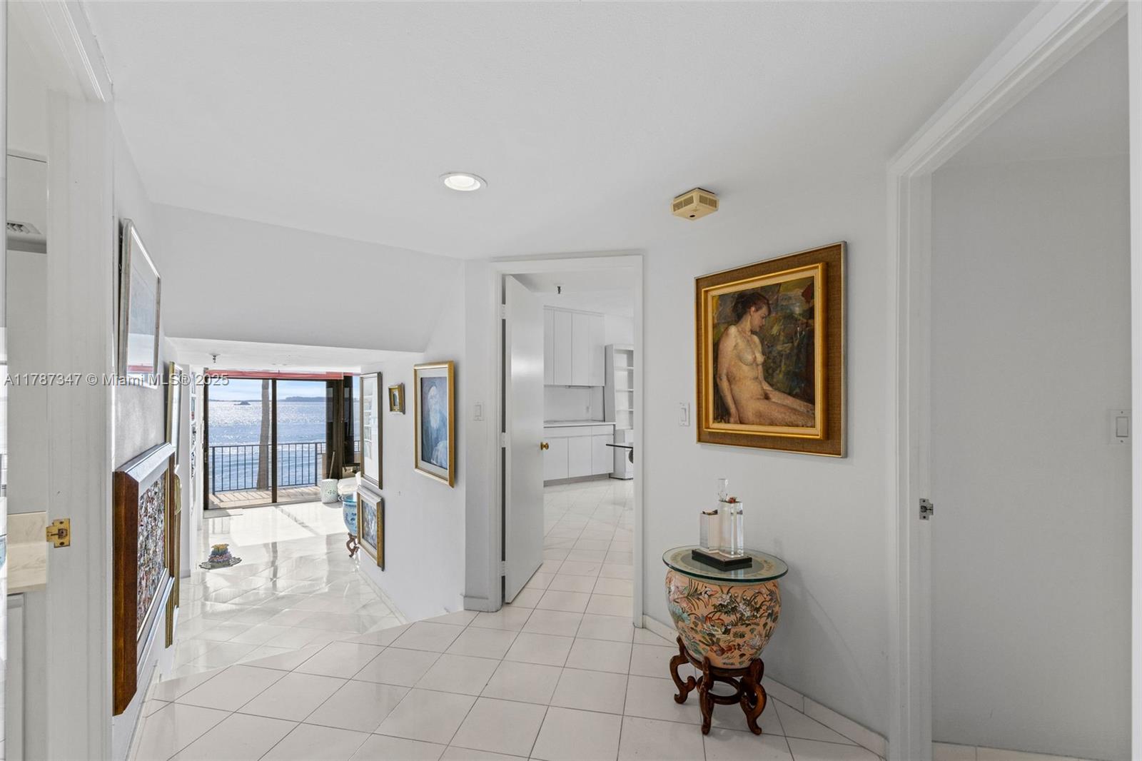 520 Brickell Key Drive, Unit A201 Miami, FL 33131 - Photo 7 of 52 a living room with furniture