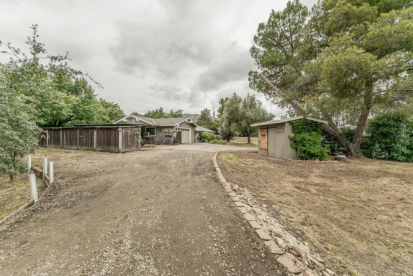 29545 Oak Meadow Road Tollhouse, CA 93667 - Photo 54 of 69 a front view of a house with a yard