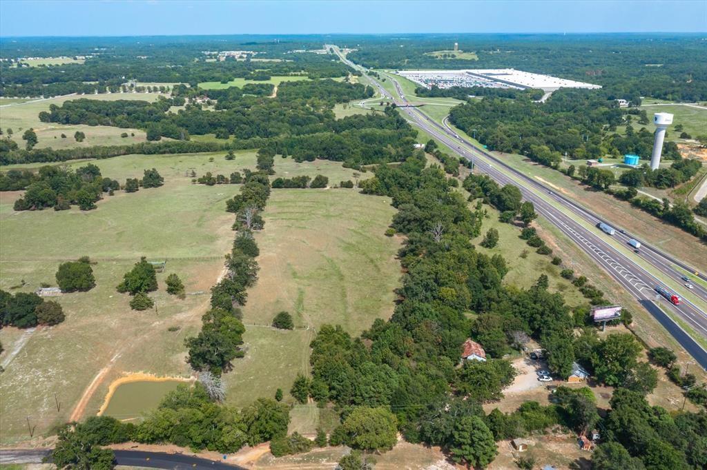 20 Interstate 20 Lindale, TX 75706 - Photo 1 of 22 an aerial view of lake residential houses with outdoor space and river