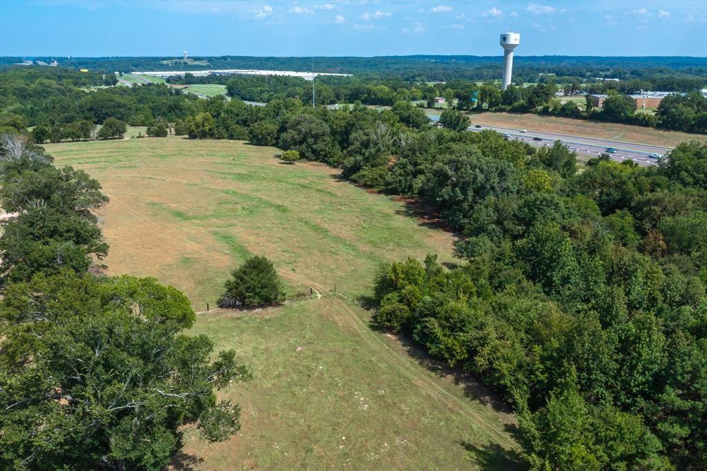 20 Interstate 20 Lindale, TX 75706 - Photo 13 of 22 an aerial view of a houses with yard and green space