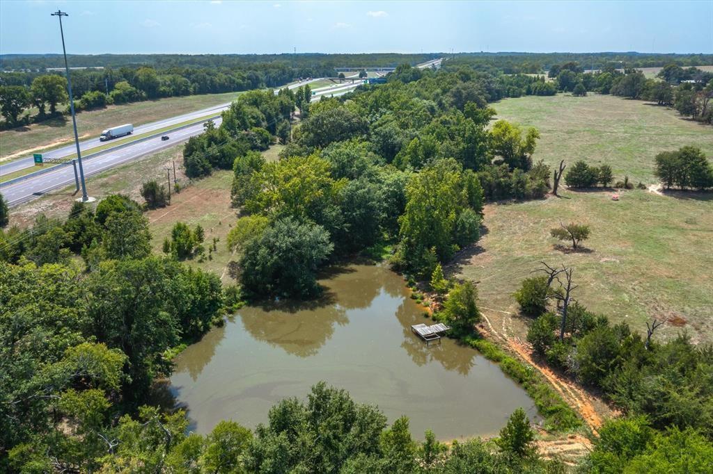 20 Interstate 20 Lindale, TX 75706 - Photo 16 of 22 a view of a lake in middle of the town