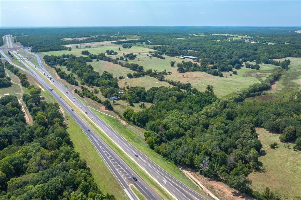 20 Interstate 20 Lindale, TX 75706 - Photo 20 of 22 an aerial view of residential houses with outdoor space and river