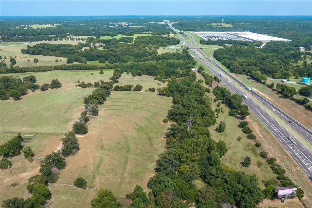 20 Interstate 20 Lindale, TX 75706 - Photo 6 of 22 a view of a lake with a city