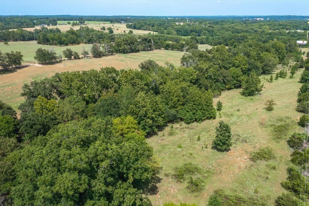 20 Interstate 20 Lindale, TX 75706 - Photo 10 of 22 a view of a lake with a city