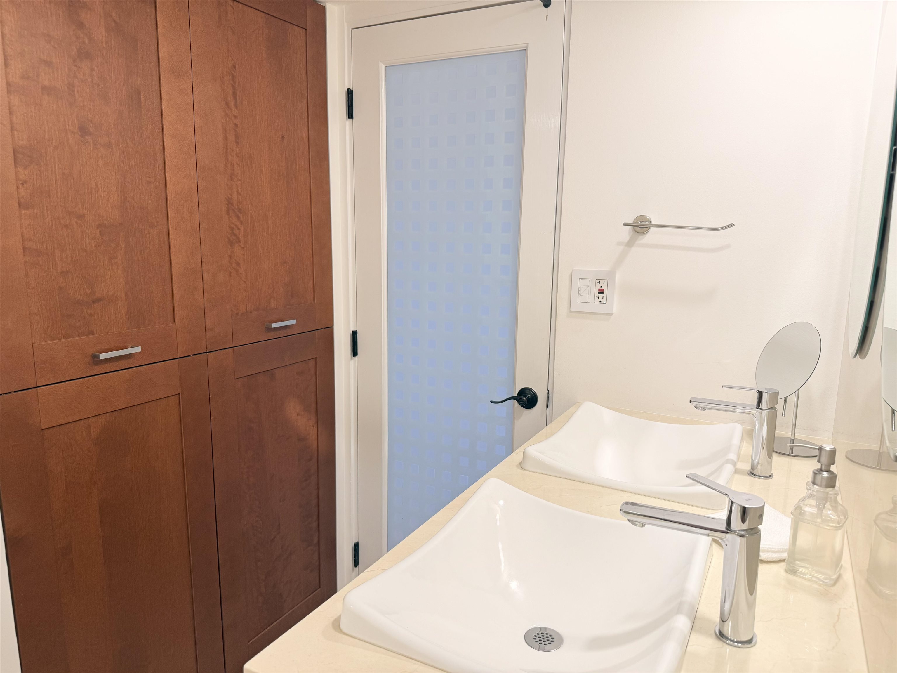 3959 Lower Honoapiilani Road, Unit 503 Lahaina, HI 96761 - Photo 21 of 47 a bathroom with a sink and a mirror