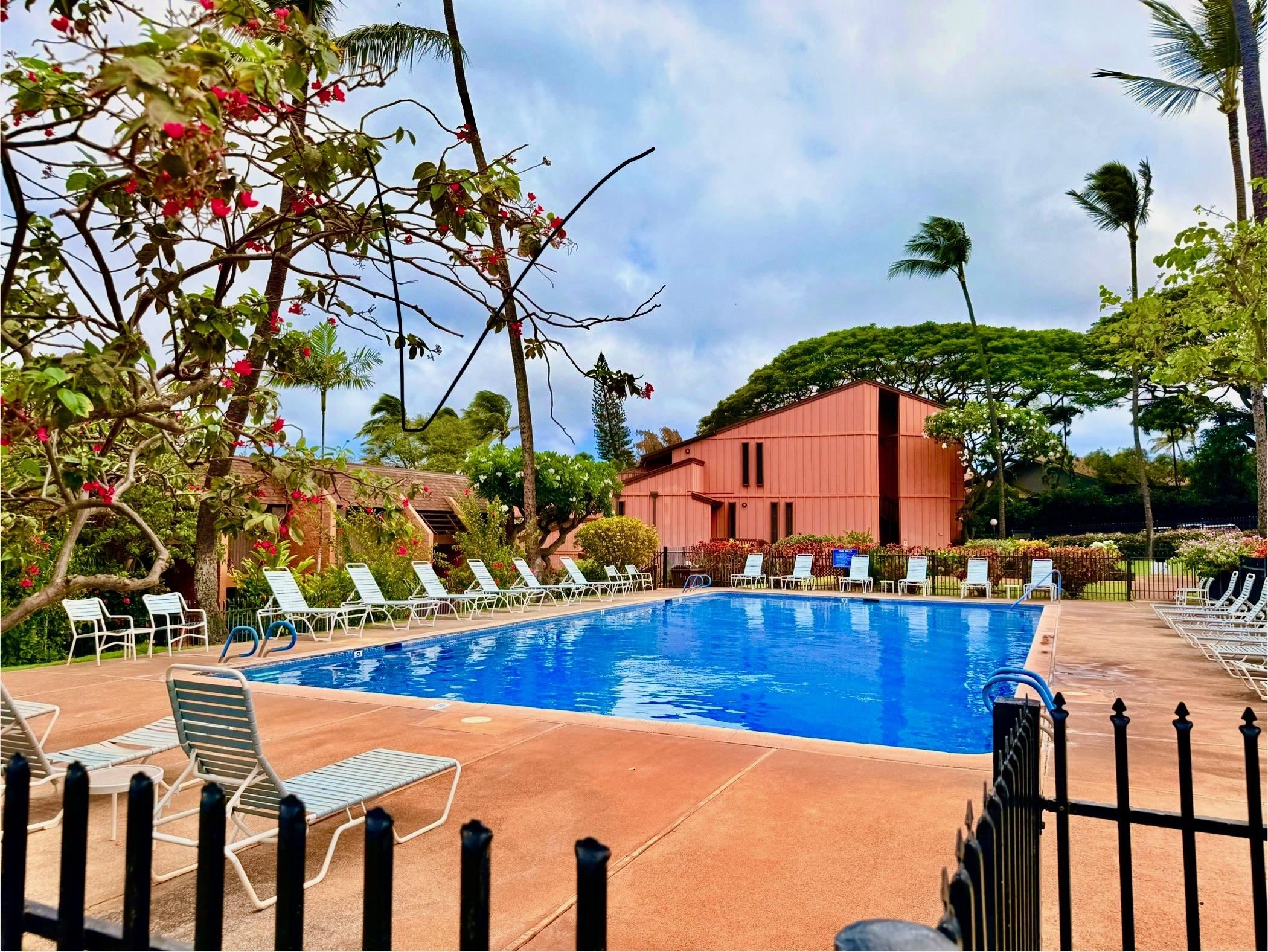 3959 Lower Honoapiilani Road, Unit 503 Lahaina, HI 96761 - Photo 31 of 47 a view of a swimming pool with a patio