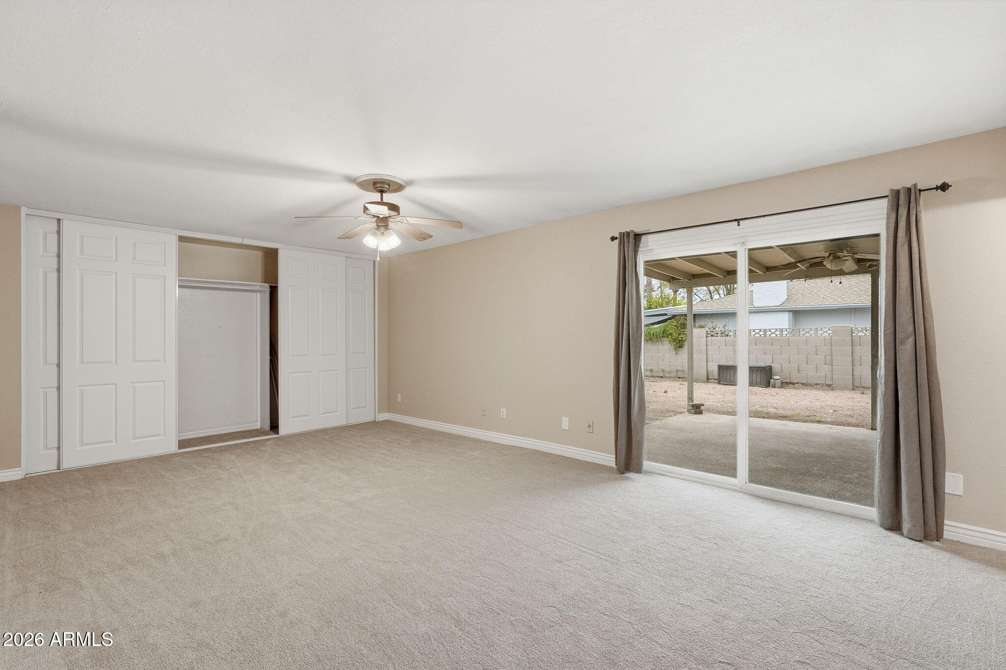 4526 South Terrace Road Tempe, AZ 85282 - Photo 22 of 30 a view of an empty room with a window