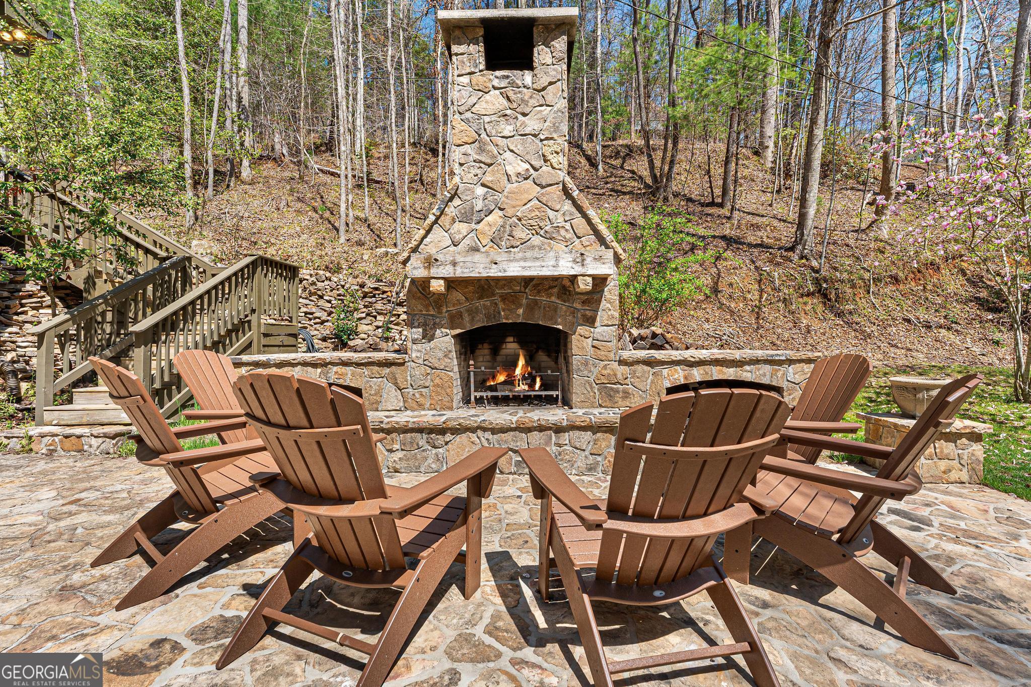 310 Blue Ridge Drive Sautee Nacoochee, GA 30571 - Photo 44 of 78 a view of a chairs and table in backyard
