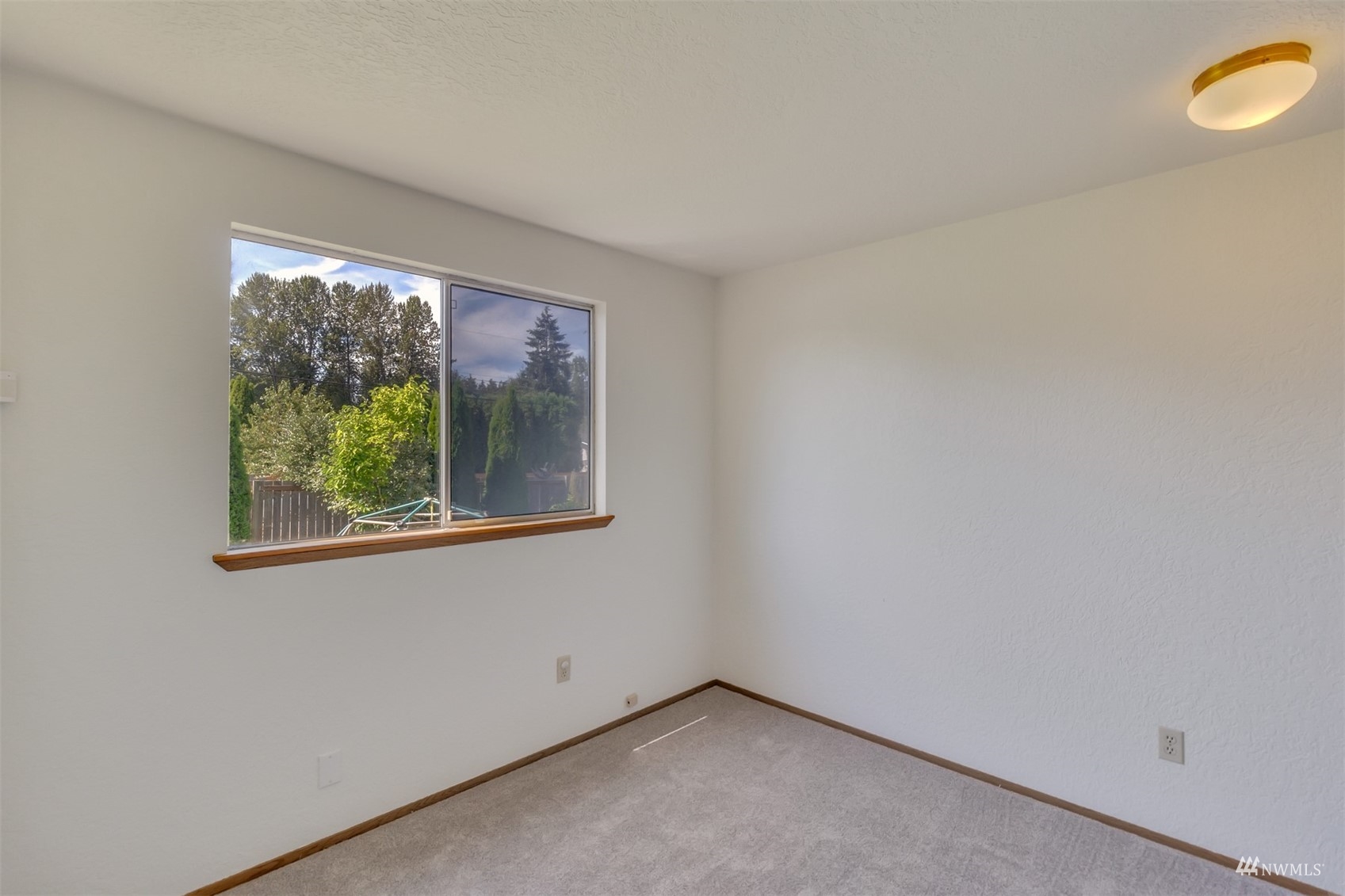 22420 13th Place West Bothell, WA 98021 - Photo 13 of 19 a view of an empty room with a window