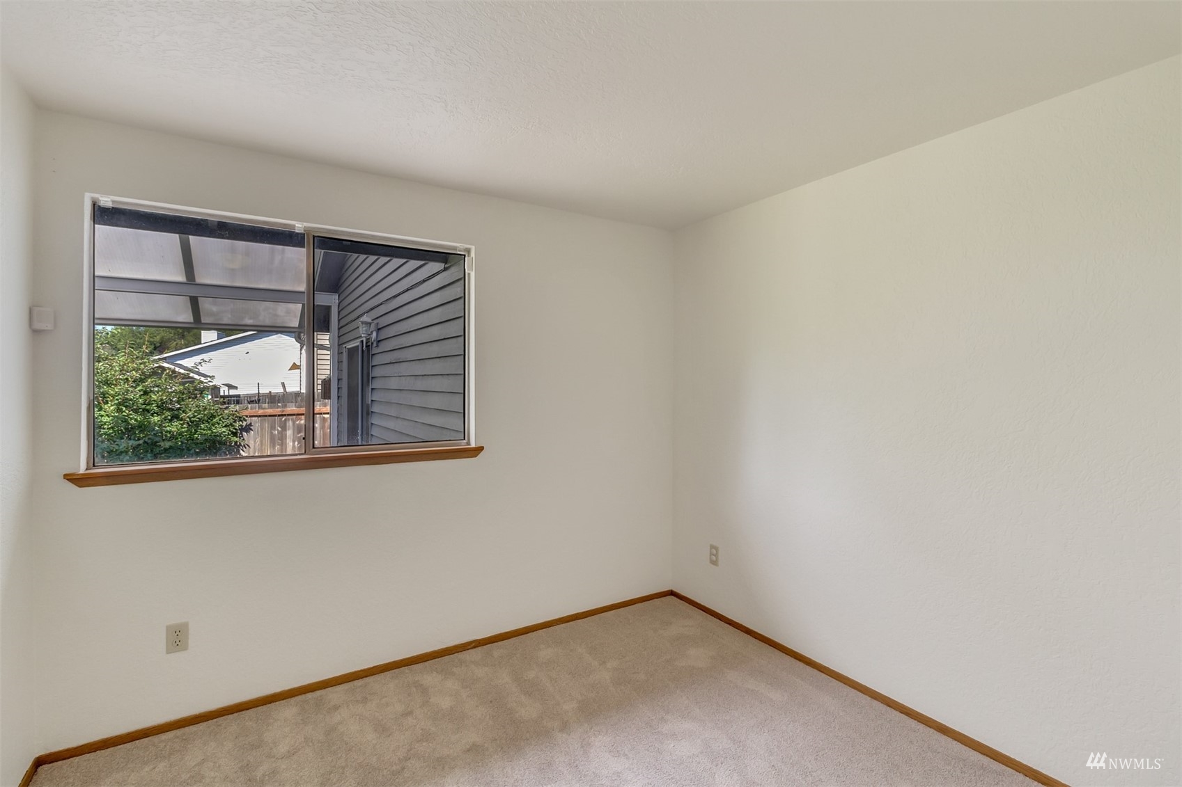 22420 13th Place West Bothell, WA 98021 - Photo 14 of 19 a view of a room that has a window in it