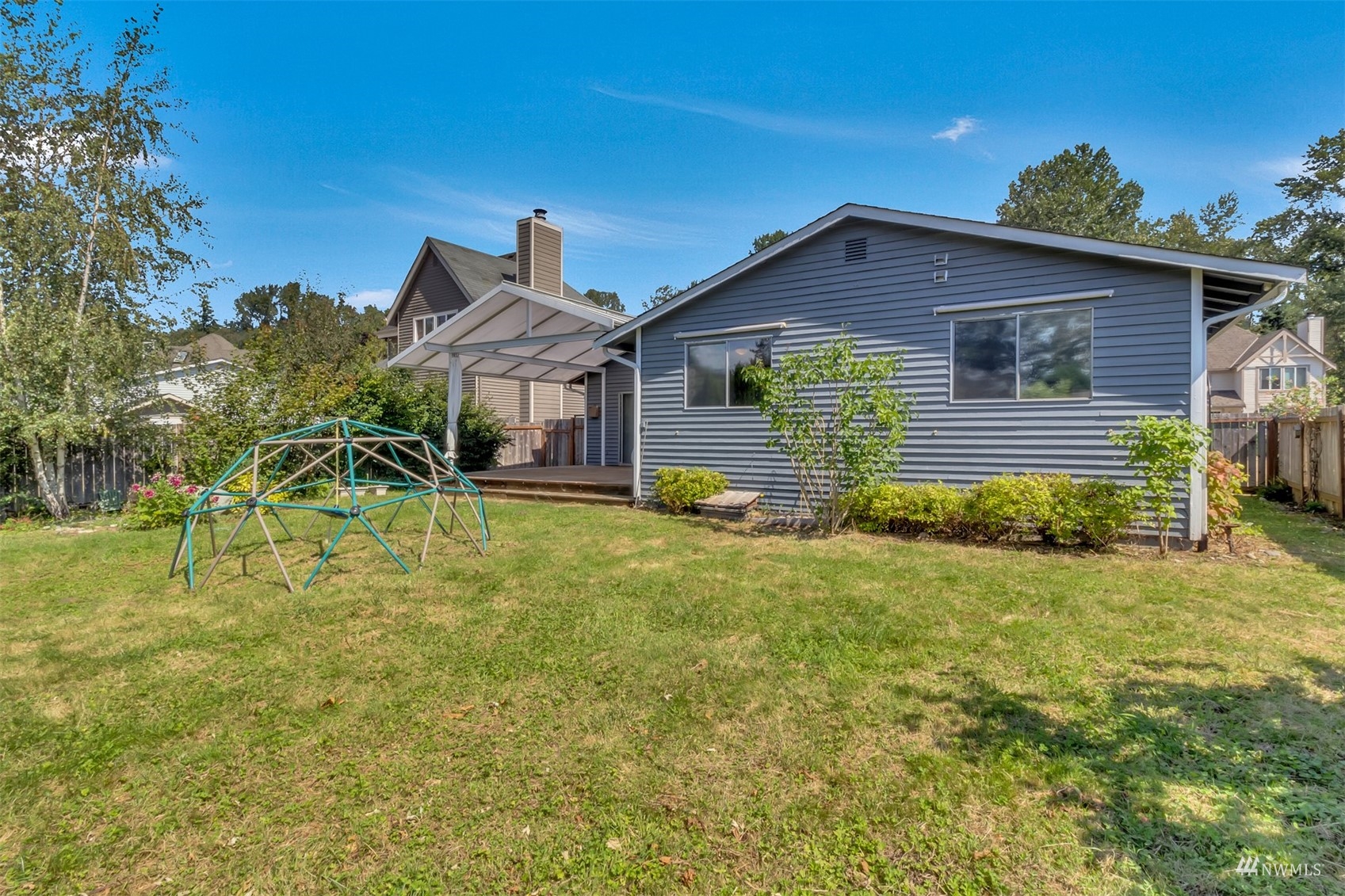 22420 13th Place West Bothell, WA 98021 - Photo 17 of 19 a front view of house with yard and green space