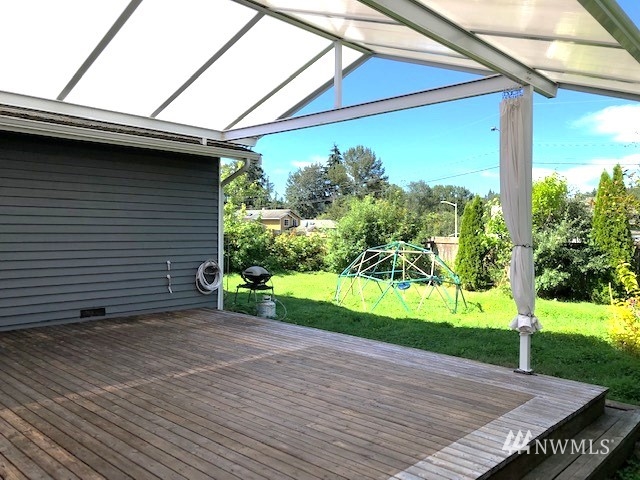 22420 13th Place West Bothell, WA 98021 - Photo 4 of 19 a view of a backyard with a garden
