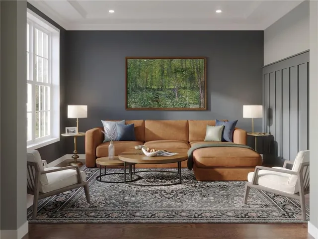 a living room with furniture and a rug