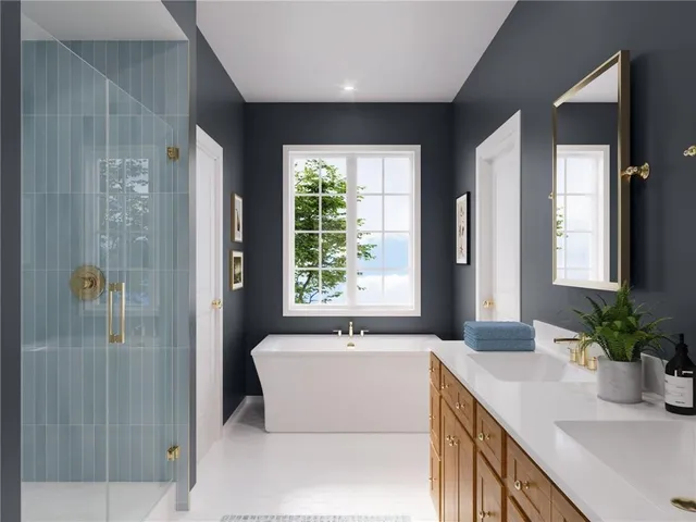 a bathroom with a bathtub and a sink