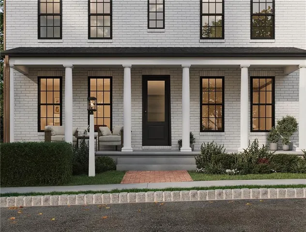 a front view of a brick house