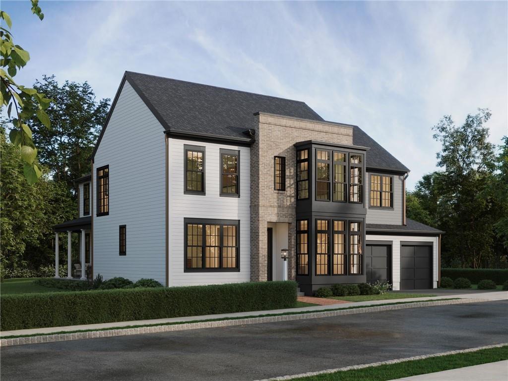 102 Ramsgate Road, Unit WEATHERBY Cranberry Township, PA 16066 - Photo 26 of 37 a front view of a house with a garden