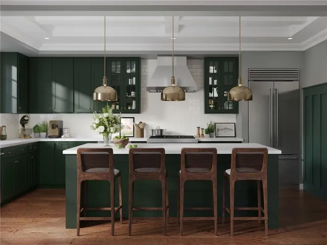 a kitchen with granite countertop a table chairs stove and cabinets