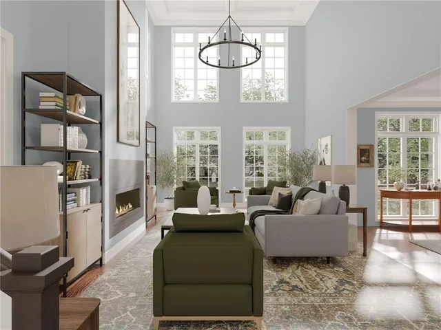 a living room with furniture a floor to ceiling window and flat screen tv