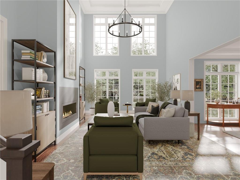 102 Ramsgate Road, Unit WEATHERBY Cranberry Township, PA 16066 - Photo 10 of 37 a living room with furniture a floor to ceiling window and flat screen tv