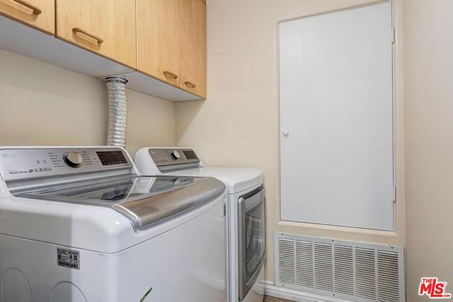 a room with a table and chairs