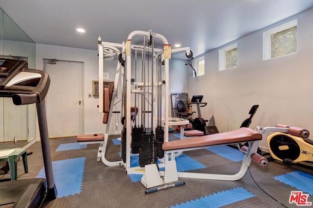 a view of parking garage with cars