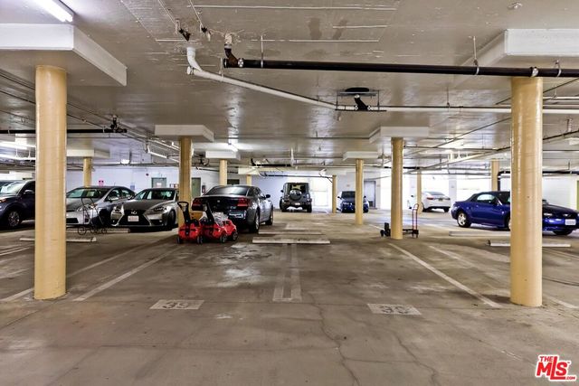 a view of a patio with a table and chairs