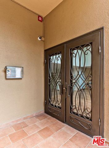 a view of a chairs and table in a room