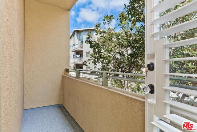 a view of a swimming pool with an outdoor space