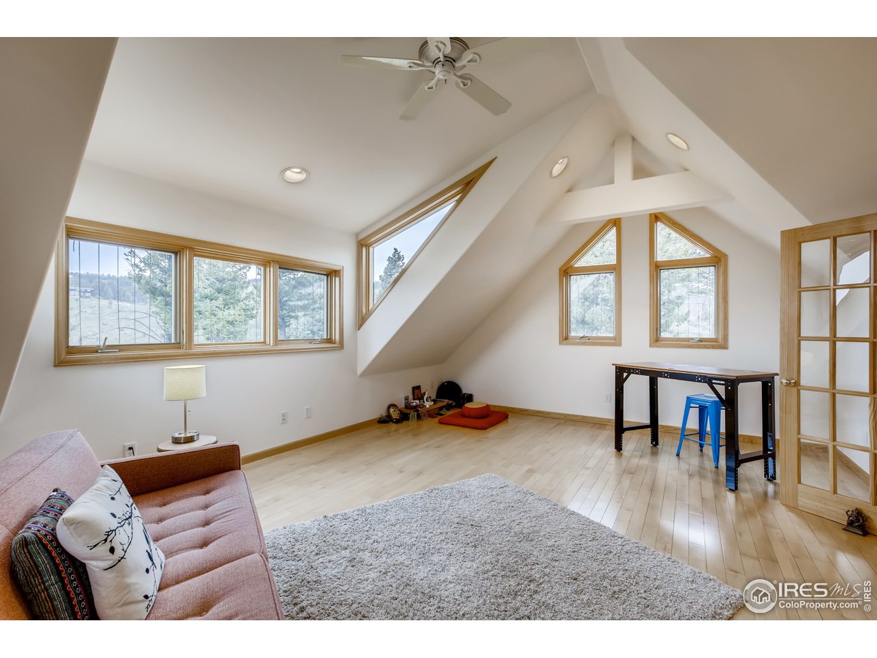 98 Rim Road Boulder, CO 80302 - Photo 15 of 31 a living room with furniture and a window