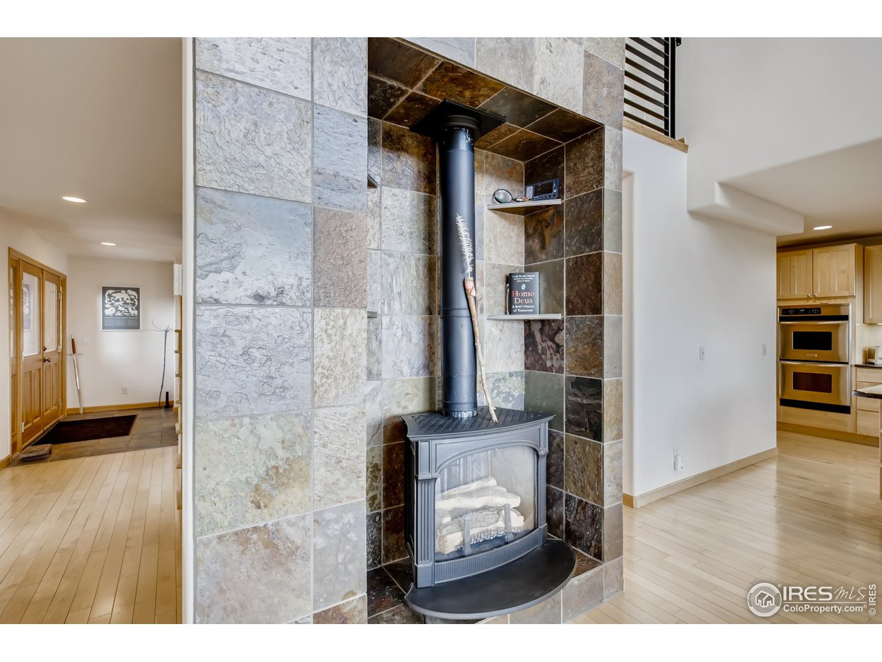 98 Rim Road Boulder, CO 80302 - Photo 22 of 31 a view of hallway with wooden floor