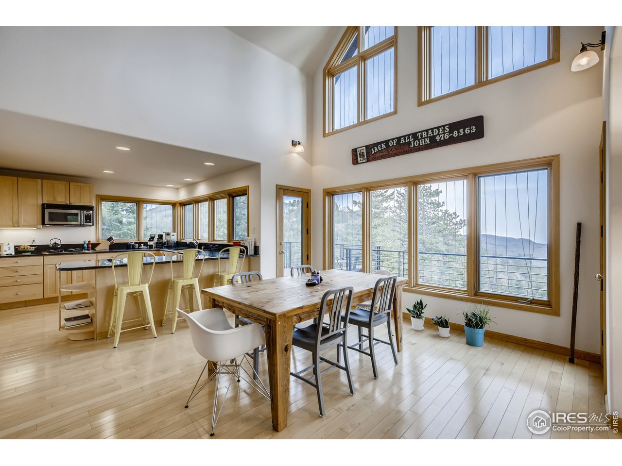 98 Rim Road Boulder, CO 80302 - Photo 6 of 31 a dinning table and chairs in the kitchen