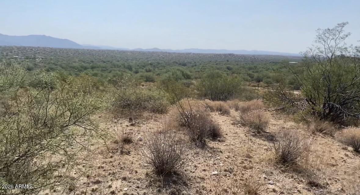 Xxx West Hawkeye Road, Unit 7 Congress, AZ 85332 - Photo 11 of 21 a view of a field with lots of trees