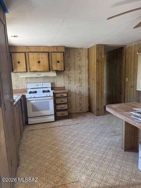 4401 North Musket Road Marana, AZ 85653 - Photo 6 of 15 a view of kitchen with stainless steel appliances granite countertop a stove top oven