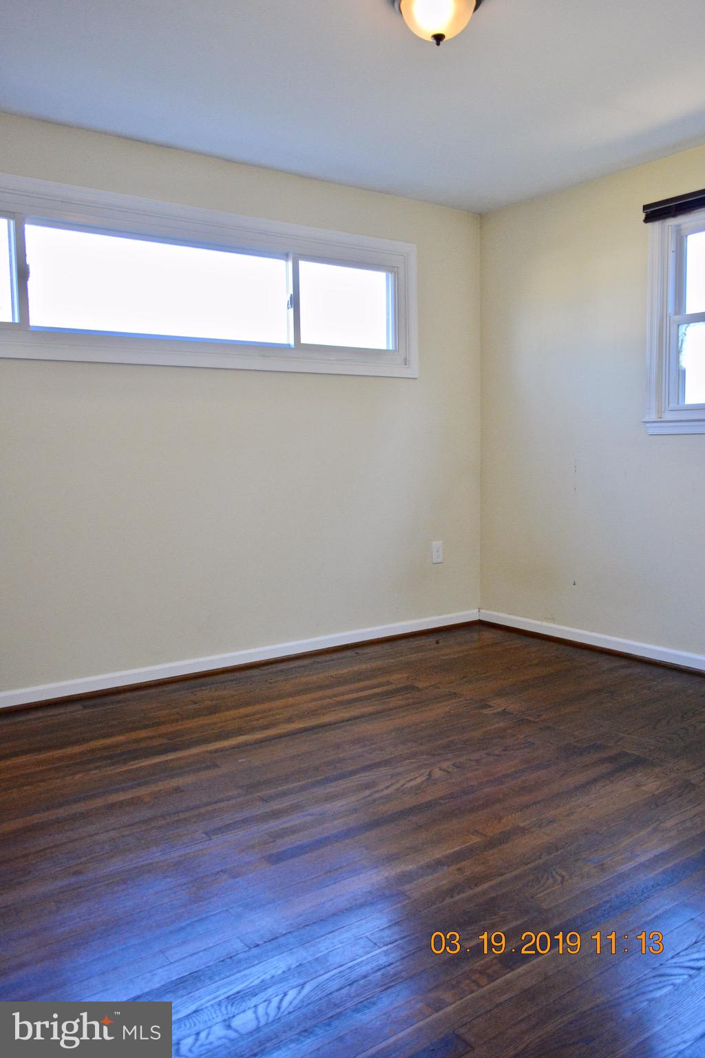 823 Cliffedge Road Baltimore, MD 21208 - Photo 11 of 32 Privacy window in front bedroom