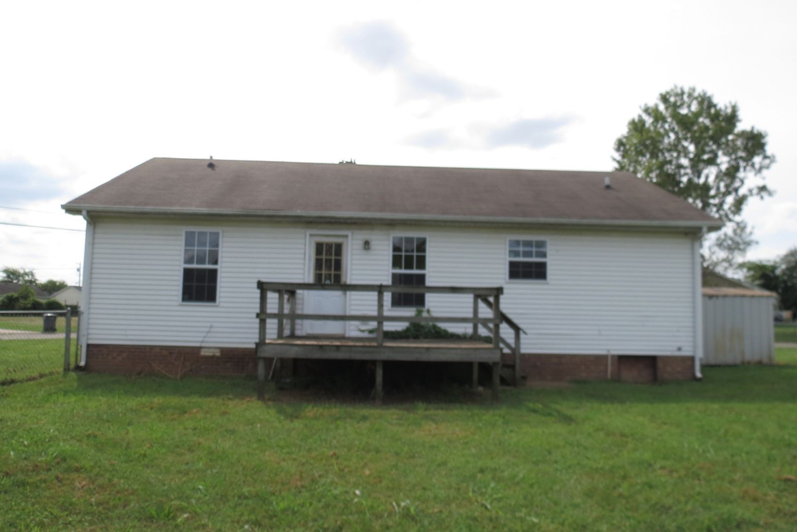 200 Rusty Drive Oak Grove, KY 42262 - Photo 12 of 14 a view of a house with backyard and sitting area