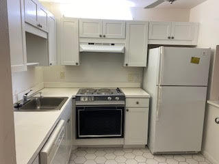 9355 Southwest 8th Street, Unit 417 Boca Raton, FL 33428 - Photo 3 of 17 kitchen w/ renovated cabinets