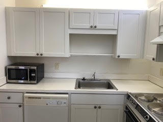 9355 Southwest 8th Street, Unit 417 Boca Raton, FL 33428 - Photo 4 of 17 white kitchen