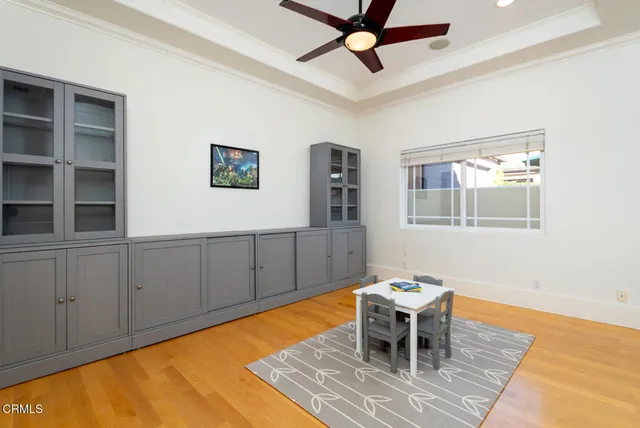 a kitchen with sink refrigerator and window