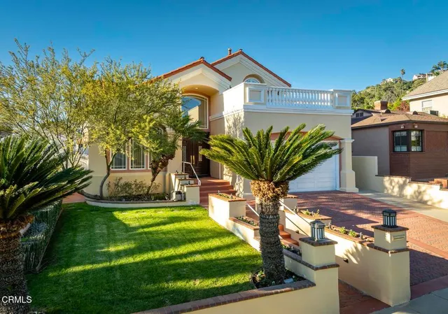 a view of a house with a swimming pool