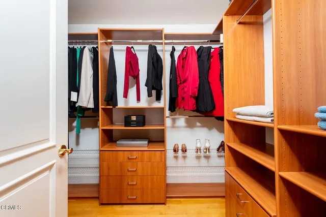 a view of a balcony with a tree
