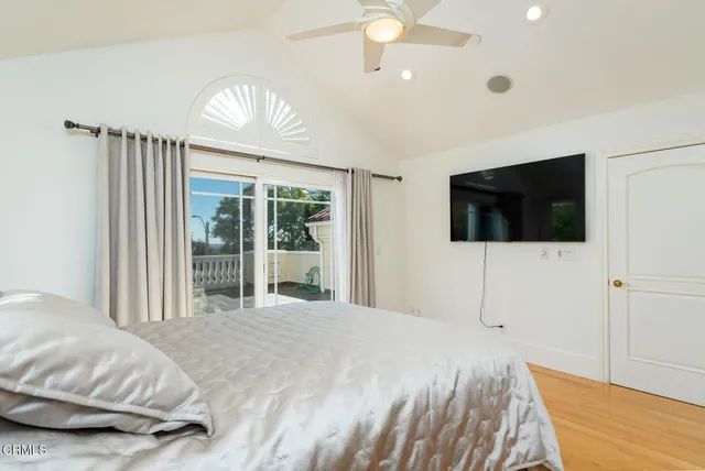 a view of a house with a yard porch and sitting area