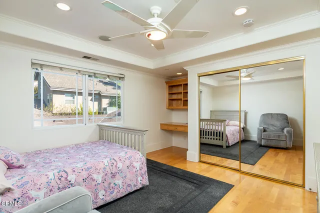 a view of a chairs and table in a patio